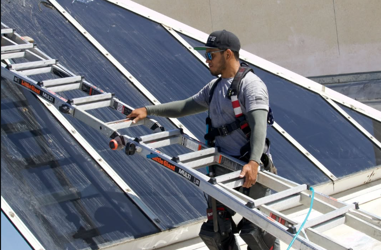 Skylight window film installation on a San Diego commercial building